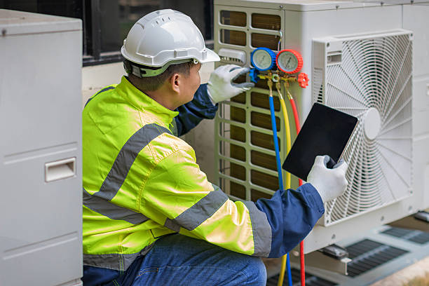 Professional Heat Pump Repair technician working in Millburn, NJ